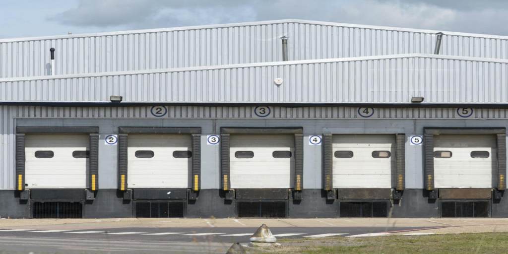 Large commercial building with bays.